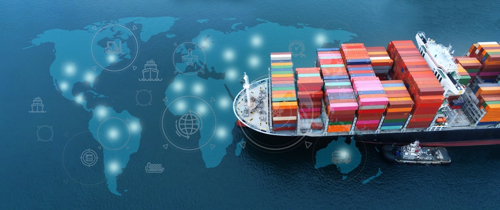 Aerial view of a logistics warehouse and shipping containers